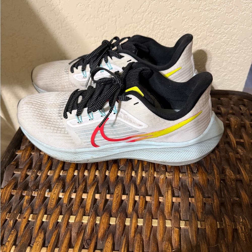 Nike White Shoes with Red and Yellow Swoosh